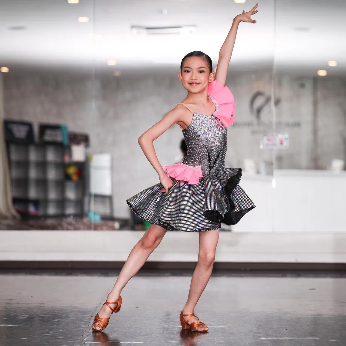 Marissa Redimerio, 9, picked up Latin ballroom dancing when she was about three-years-old.
