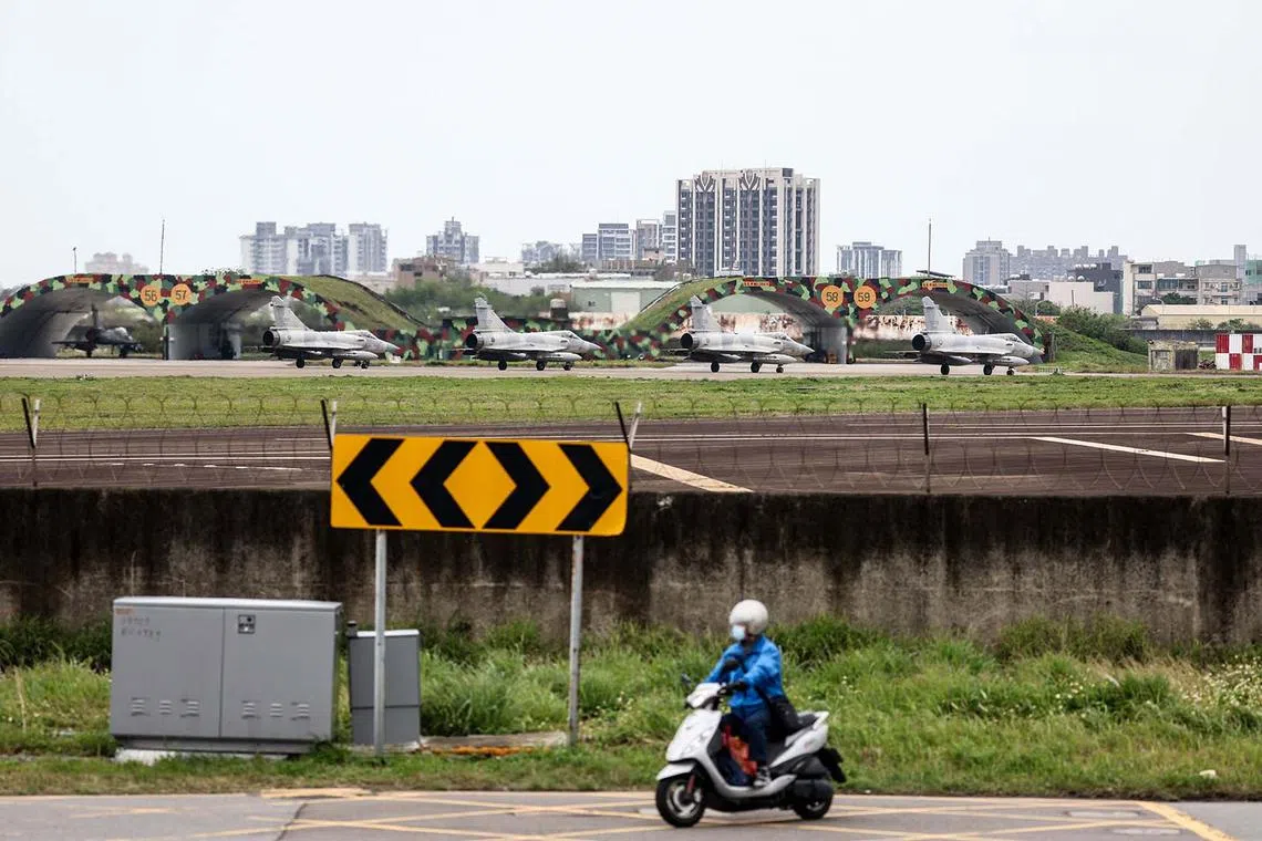 TOPSHOT - Four Taiwan Air Force Mirage 2000 fighter jets prepare to take off from Hsinchu Airbase in Hsinchu on April 2, 2025. The Chinese military announced new exercises on April 2, in sensitive waters near Taiwan, in a second consecutive day of drills around the self-ruled island it claims as its own. (Photo by I-HWA CHENG / AFP)