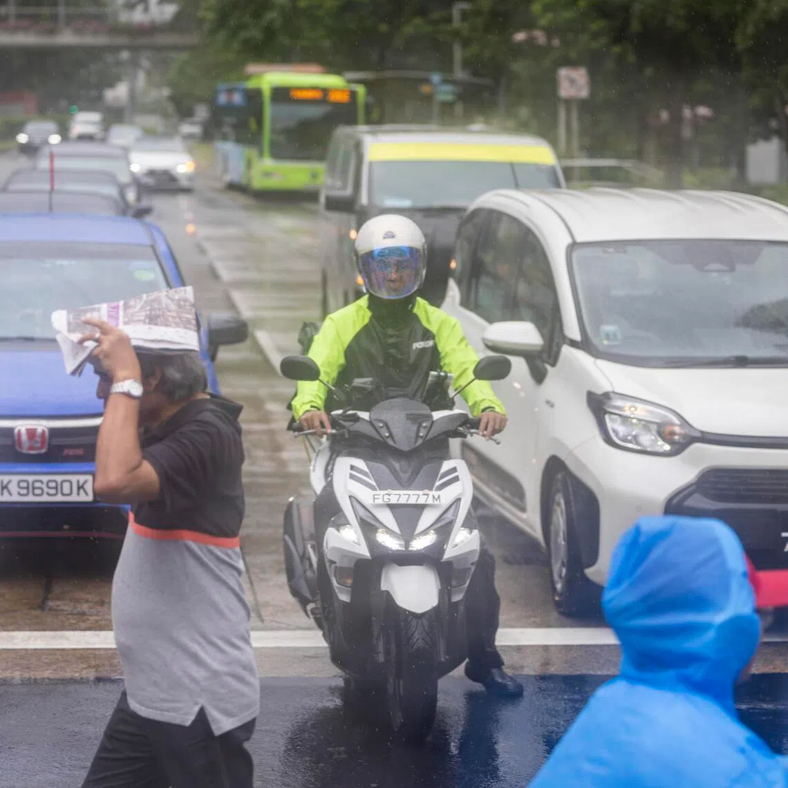 ST20250911_202559600515/pixgenerics/Brian Teo/Generic of passers-by walking in the rain at Clementi on Sept 11, 2025. Can be used for stories on rain, wet weather, climate change, monsoon. ST PHOTO: BRIAN TEO