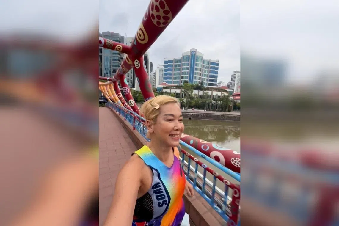Singaporean host-actress Kym Ng running on Alkaff Bridge at Mohamed Sultan on a weekend.
