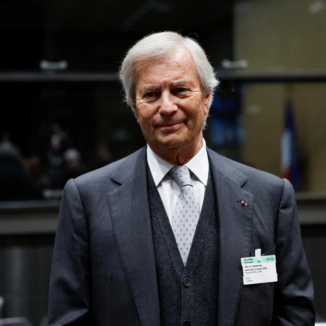FILE PHOTO: French billionaire Vincent Bollore, who controls media and advertising group Vivendi, poses before a hearing of the French parliament's commission of inquiry into the allocation, content and control of authorisations for national television services on digital terrestrial television at the National Assembly in Paris, France, March 13, 2024. REUTERS/Benoit Tessier/ File Photo
