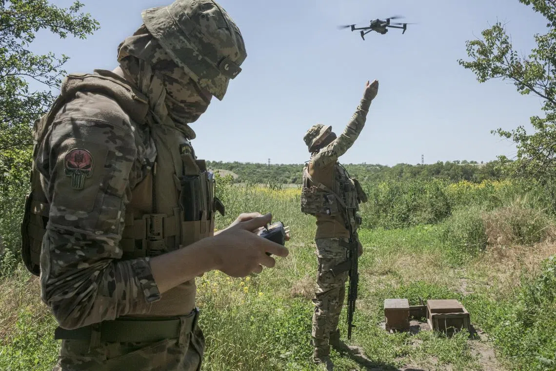 Ukrainian soldiers testing a drone outside their compound near Lyman, in eastern Ukraine on Monday. 