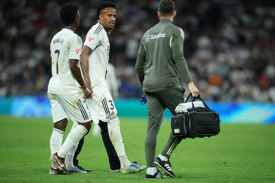FILE PHOTO: Soccer Football - LaLiga - Real Madrid v Deportivo Alaves - Santiago Bernabeu, Madrid, Spain - April 21, 2026 Real Madrid's Eder Militao walks off to be substituted after sustaining an injury REUTERS/Isabel Infantes/File Photo