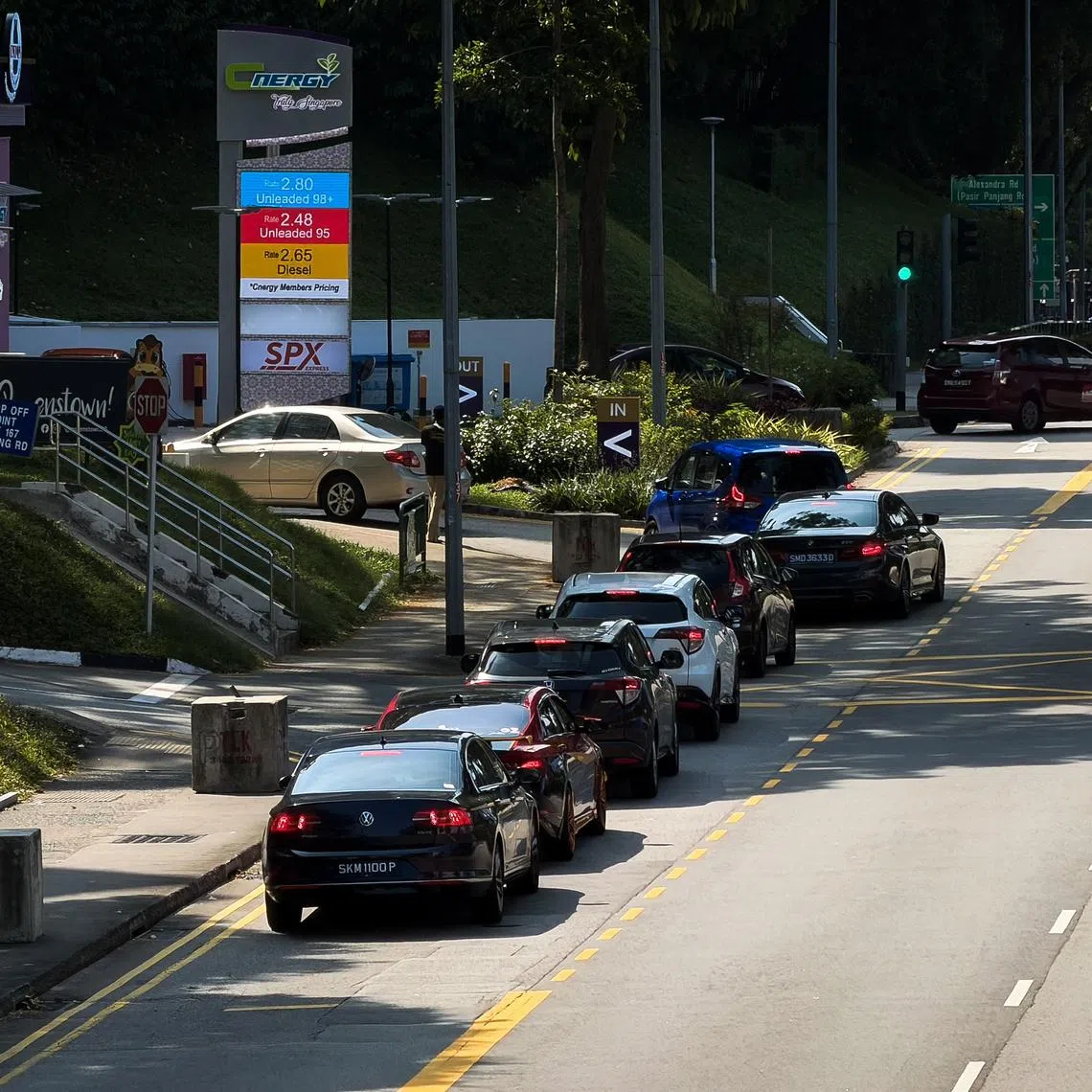 Vehicles queueing for petrol at Cnergy station at Queensway at 10.27am on March 23.