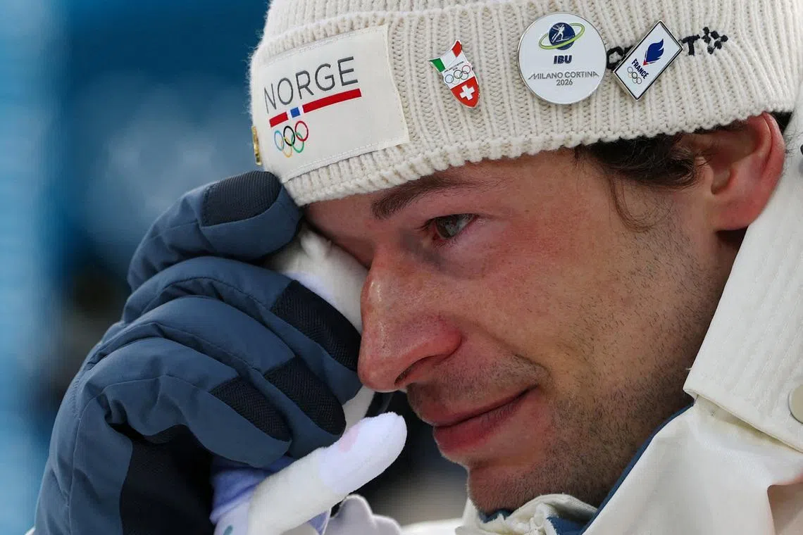 Milano Cortina 2026 Olympics - Biathlon - Men's 20km Individual Victory Ceremony - Anterselva Biathlon Arena, South Tyrol, Italy - February 10, 2026. Bronze medallist Sturla Holm Laegreid of Norway celebrates after finishing third in the Men's 20km Individual REUTERS/Matthew Childs