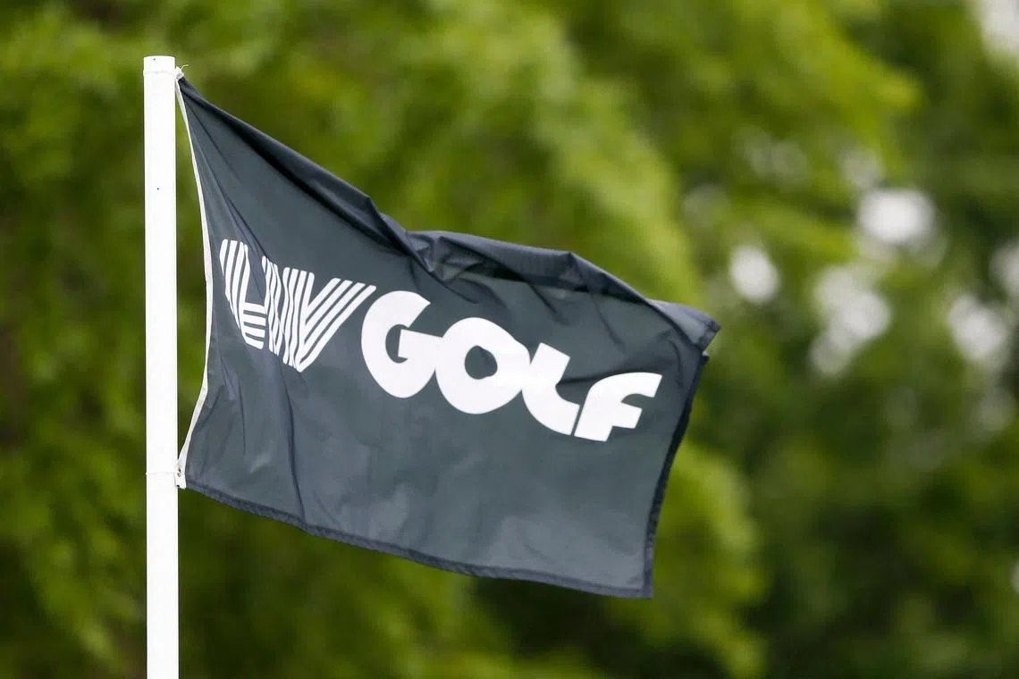 A LIV Golf flag blows in the wind during the first day of the LIV Golf Invitational in Broken Arrow, Oklahoma.