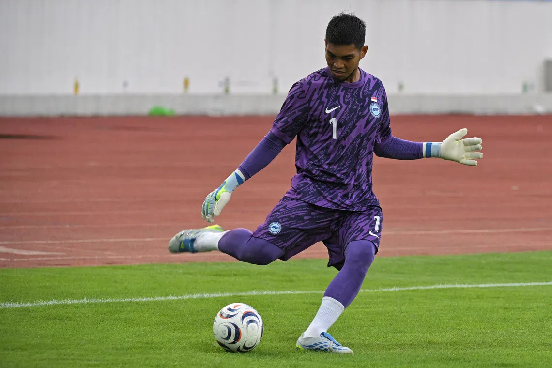 Singapore goalkeeper Izwan Mahbud during the national team training at the My Dinh Stadium in Hanoi on July 30.