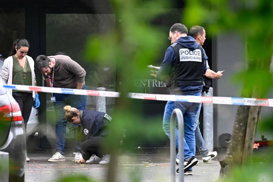 Police officers are at work on the site of a shooting that occured overnight during a wedding party in Thionville, eastern France, on June 30, 2024. A person was killed and four other wounded during the shooting. (Photo by Jean-Christophe VERHAEGEN / AFP)