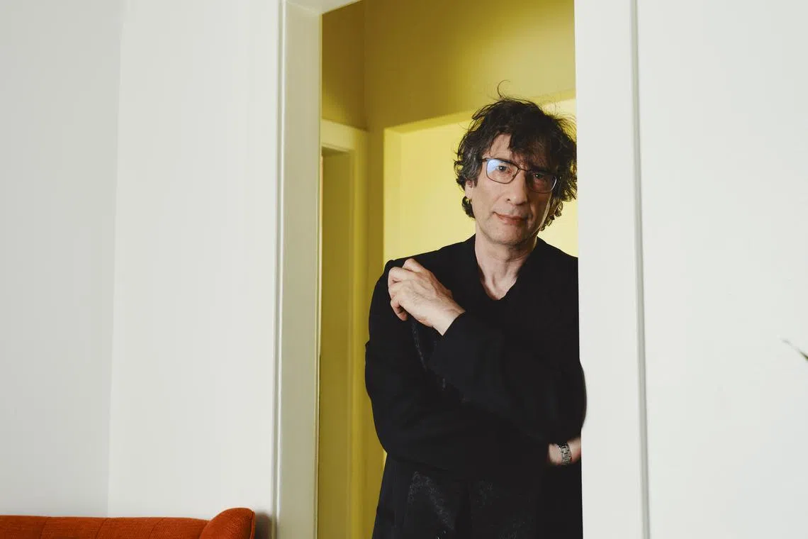 FILE — The author Neil Gaiman in Los Angeles, May 16, 2019. The production of a movie based on a book by the noted British author Neil Gaiman has been paused by Disney amid allegations that five women have made against him relating to conduct from 1986 to 2002, including one woman who said Mr. Gaiman groped her on a tour bus in 2013 and later paid her $60,000. (Rozette Rago/The New York Times)