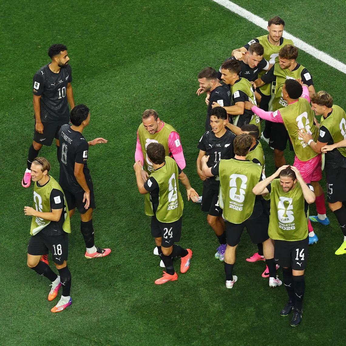 Soccer Football - FIFA World Cup 2026 - Group G - Iran v New Zealand - Los Angeles Stadium, Inglewood, California, U.S. - June 15, 2026 New Zealand's Elijah Just celebrates scoring their second goal with teammates REUTERS/Lisi Niesner