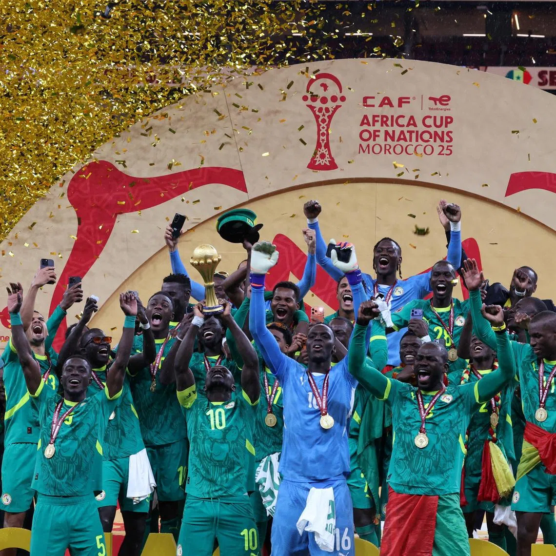 FILE PHOTO: Soccer Football - CAF Africa Cup of Nations - Morocco 2025 - Final - Senegal v Morocco - Prince Moulay Abdellah Stadium, Rabat, Morocco - January 18, 2026 Senegal's Sadio Mane lifts the trophy with teammates as they celebrate after winning the Africa Cup of Nations REUTERS/Amr Abdallah Dalsh/File Photo