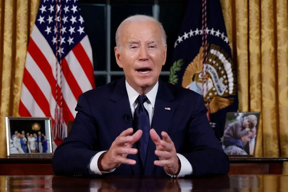 U.S.  President Joe Biden delivers a prime-time address to the nation about his approaches to the conflict between Israel and Hamas, humanitarian assistance in Gaza and continued support for Ukraine in their war with Russia, from the Oval Office of the White House in Washington, U.S. October 19, 2023. REUTERS/Jonathan Ernst/Pool/ File Photo