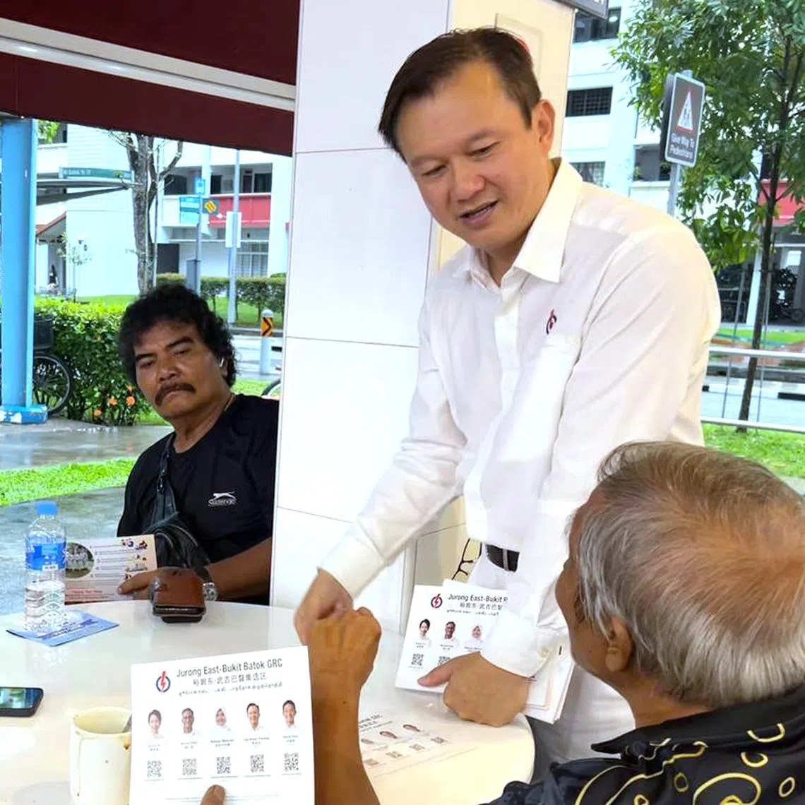 PAP's Jurong East-Bukit Batok GRC candidate Lee Hong Chuang on a coffeeshop walkabout at 324 Bukit Batok St 33 on April 26.