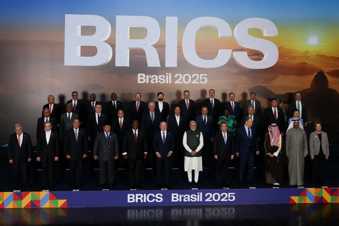 Leaders of the BRICS group pose for the family photo during the BRICS Summit in Rio de Janeiro, Brazil July 7, 2025. REUTERS/Pilar Olivares