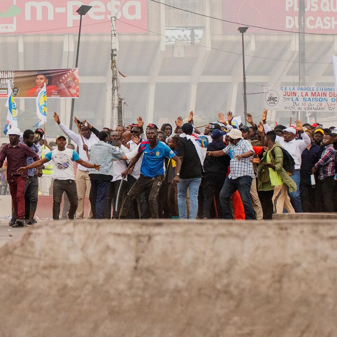 A crowd of protesters gather near the parliament building in Kinshasa, Democratic Republic of Congo, June 12, 2026.    REUTERS/Aristote Lokinda