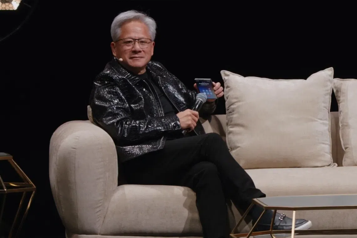 Nvidia CEO Jensen Huang puts Trump on speakerphone while downplaying AI risks