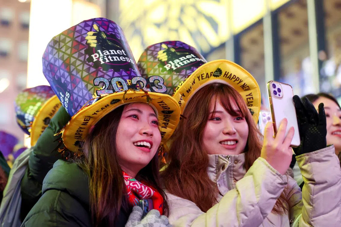 People gather in Times Square during the first New Year's Eve event without restrictions since the coronavirus disease (COVID-19) pandemic in the Manhattan borough of New York City, New York, U.S., Dec 31, 2022. 