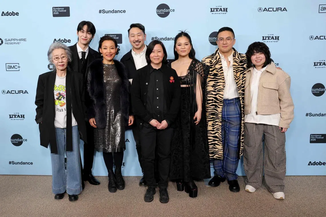 The Wedding Banquet team with Sundance Film Festival’s director of programming Kim Yutani (centre) at the film’s premiere on Jan 25.  From left are Youn Yuh-jung, Han Gi-chan, Joan Chen, Andrew Ahn, Kelly Marie Tran, Bowen Yang and Bobo Le.