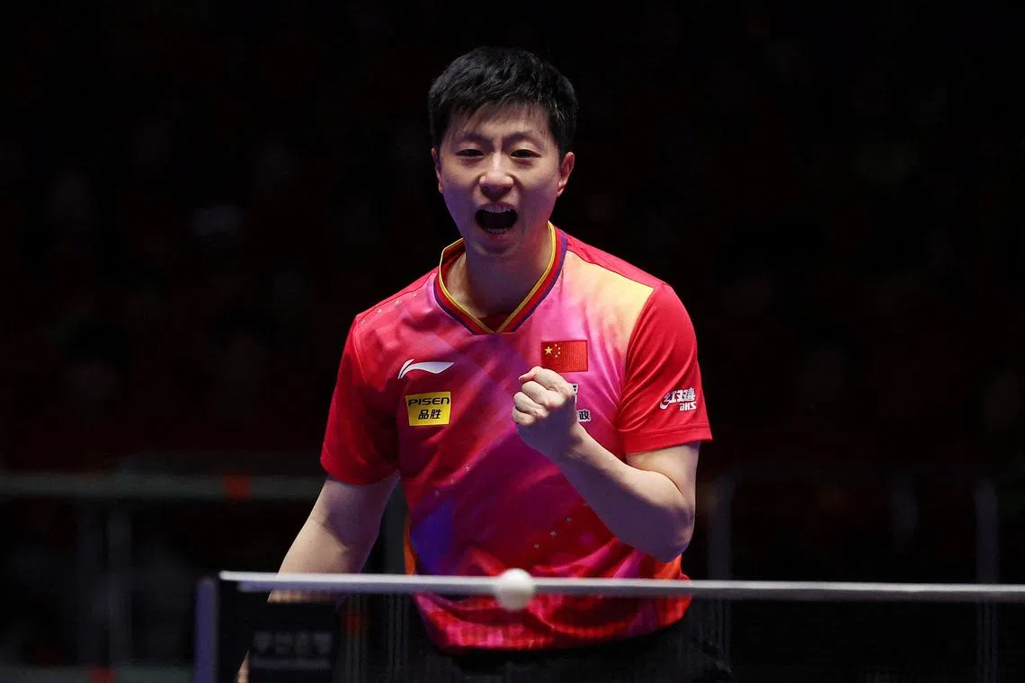 FILE PHOTO: Table Tennis - China's Ma Long reacts during his men's teams final match against France's Simon Gauzy at the 2024 ITTF World Team Table Tennis Championships Finals at the Busan Exhibition and Convention Centre, in Busan, South Korea February 25, 2024 REUTERS/Kim Hong-Ji/File Photo
