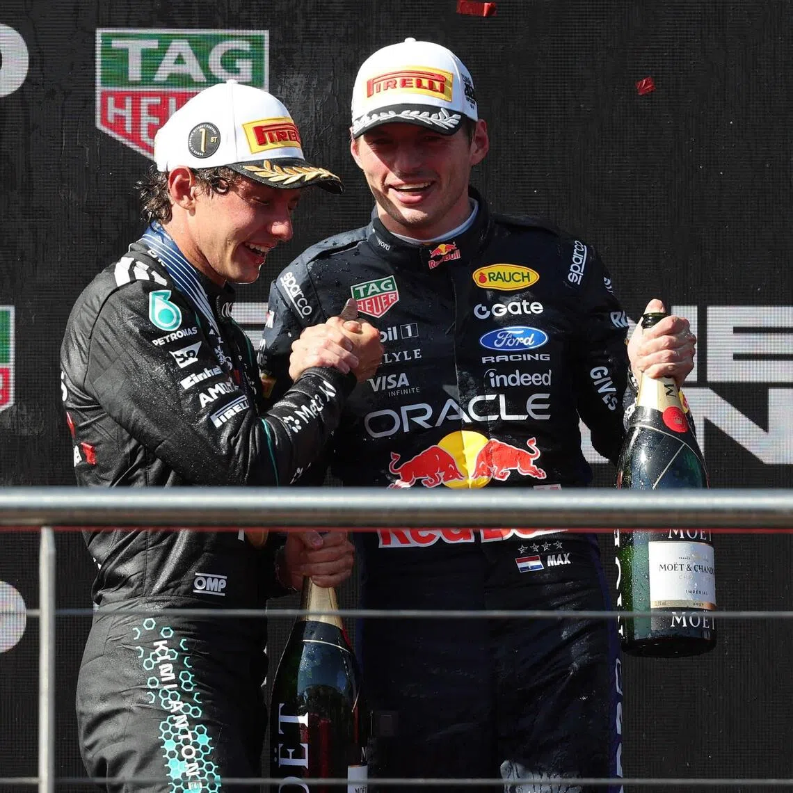 Mercedes’ Spanish Formula 1 Grand Prix winner, Italian driver Kimi Antonelli (left), and Red Bull’s second-placed Dutch driver Max Verstappen celebrating on the Madring circuit podium on Sept 13, in Madrid.