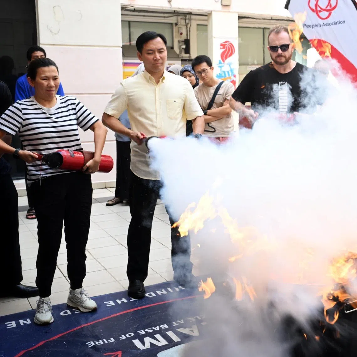 Minister of State for Home Affairs and Social and for Family Development Goh Pei Ming (second from left) joining residents in a Responder Plus Programme at Joo Chiat Community Club on Aug 30.