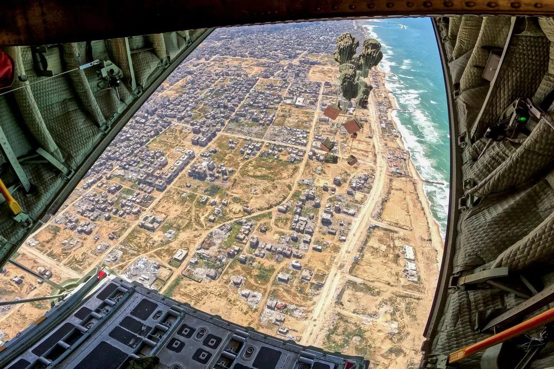 Humanitarian aid released from the RSAF’s C-130 transport aircraft.