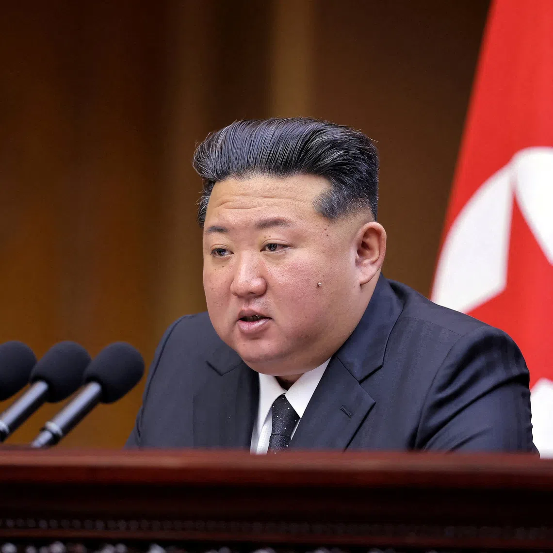 FILE PHOTO: North Korean leader Kim Jong Un speaks during a meeting of the Supreme People's Assembly at the Mansudae Assembly Hall in Pyongyang, North Korea, in this picture released September 22, 2025 by North Korea's official Korean Central News Agency. KCNA via REUTERS/File Photo