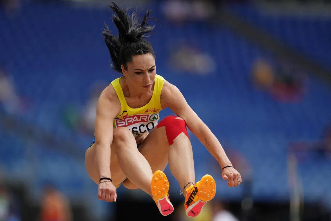 FILE PHOTO: Athletics - European Athletics Championships - Stadio Olimpico, Rome, Italy - June 11, 2024 Romania's Florentina Costina Iusco in action during the women's long jump qualification REUTERS/Aleksandra Szmigiel/File Photo