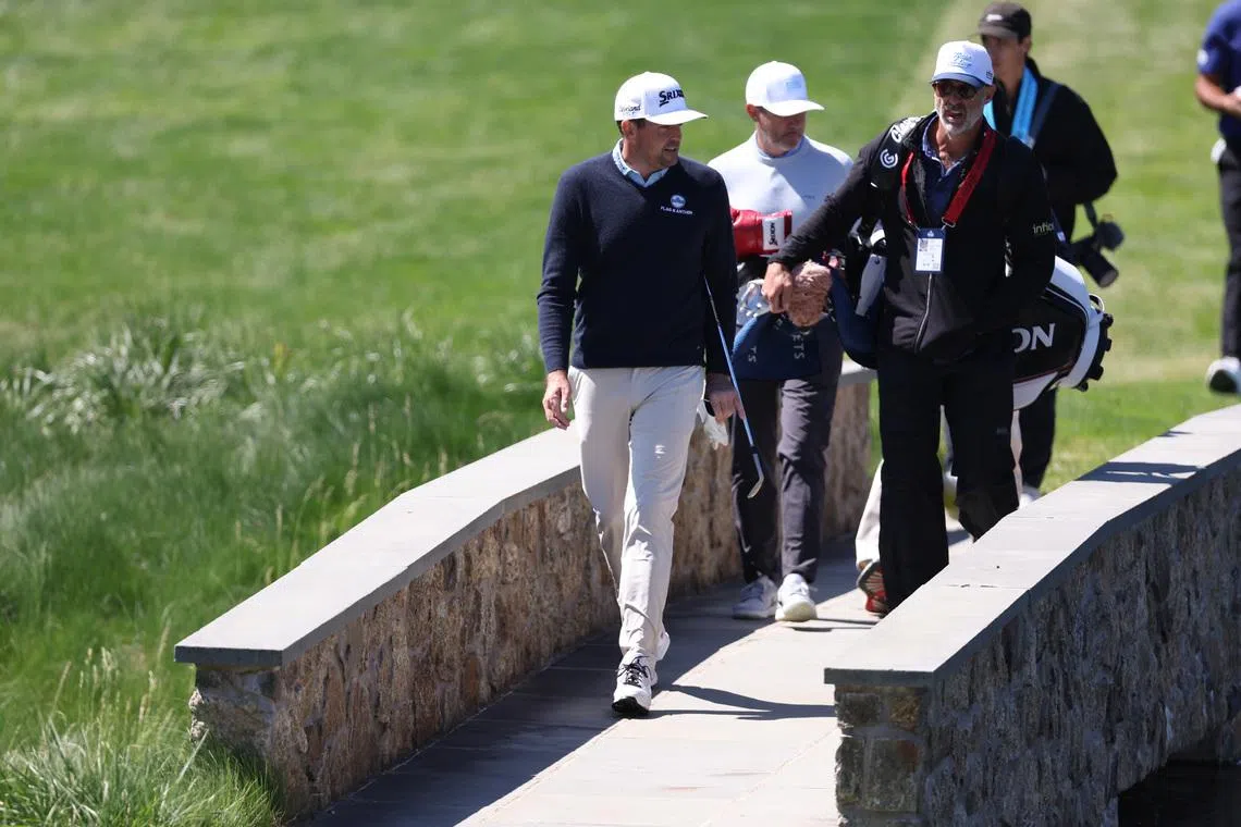 May 12, 2026; Newtown Square, Pennsylvania, Keegan Bradley walks up the seventeenth hole during a practice round of the PGA Championship golf tournament at Aronimink Golf Club. Mandatory Credit: Bill Streicher-Imagn Images