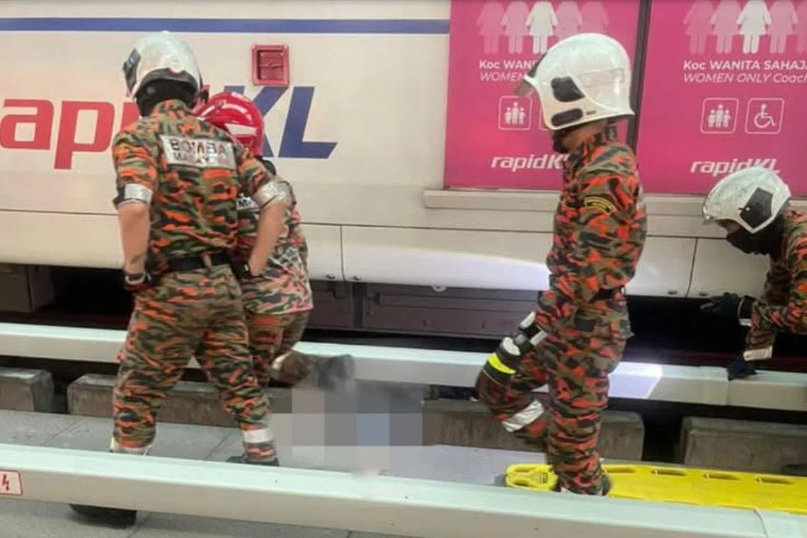 Selangor rescue officers found the man unresponsive on the tracks under an LRT train. 