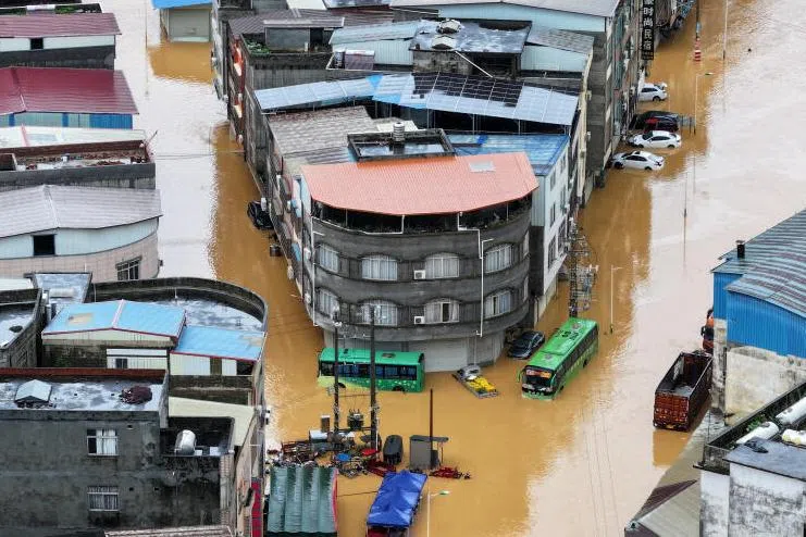 Flooding in Pingshan village on July 6 after Typhoon Maysak unleashed heavy rainfall in Hengzhou, Guangxi Zhuang Autonomous Region, China.