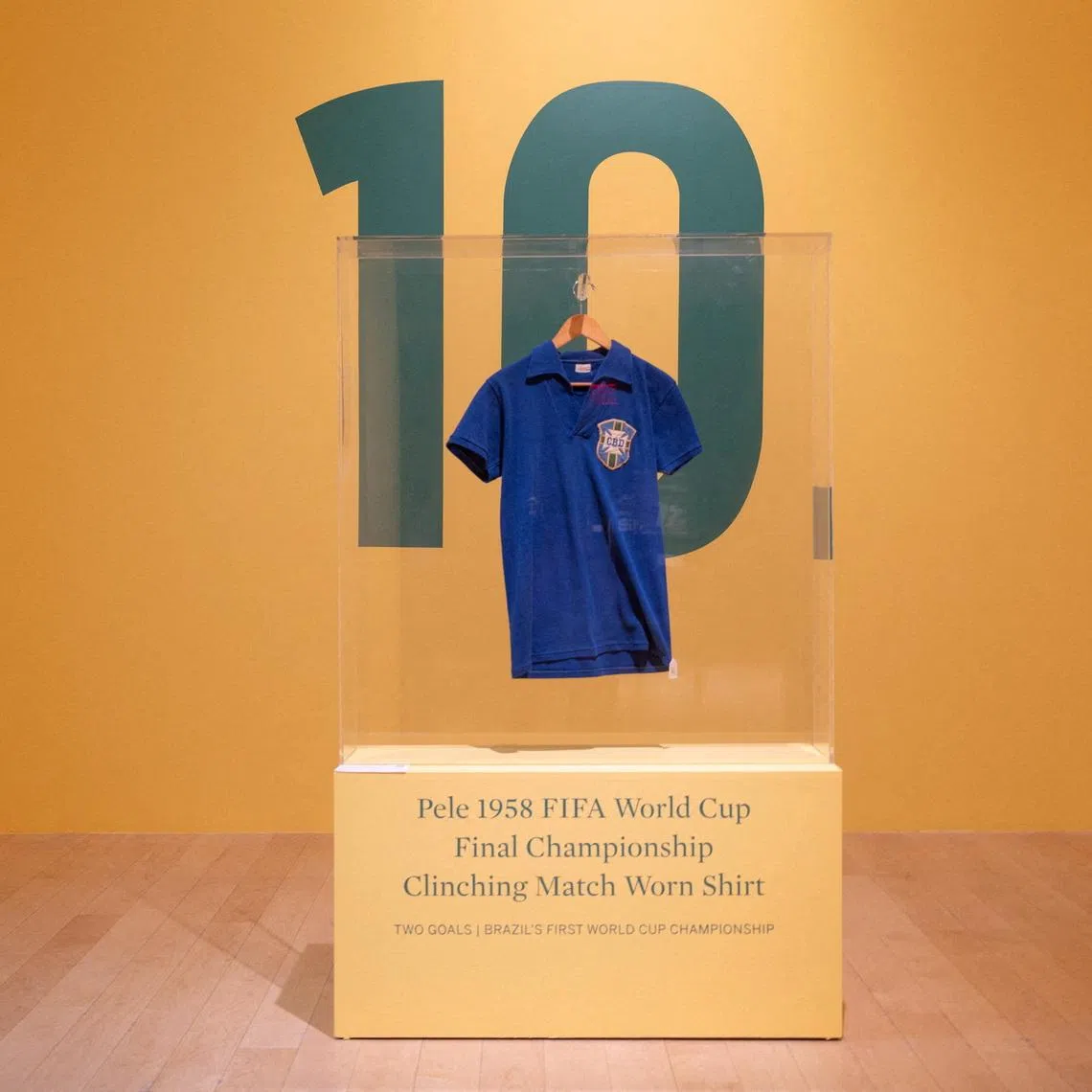Brazil’s football legend Pele’s FIFA World Cup 1958 final jersey at Sotheby’s auction house in New York on July 1.
