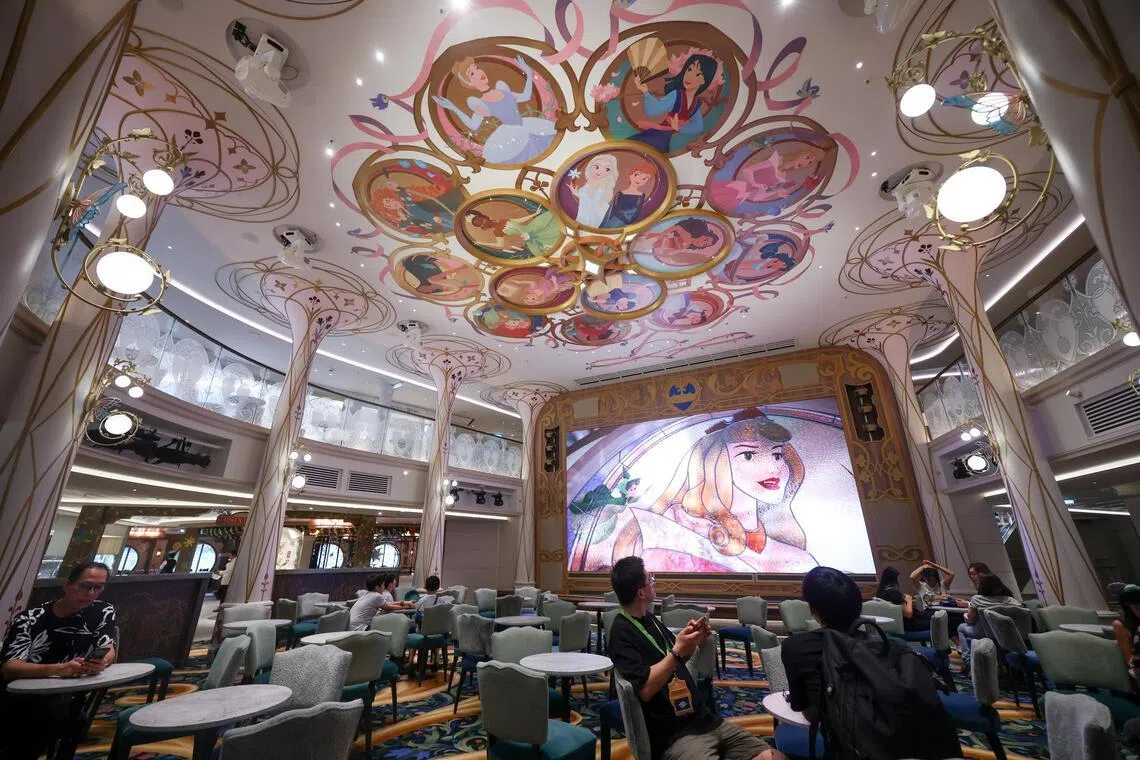 The ceiling of Town Square depicts artwork of 13 Disney princesses, including Jasmine, Mulan, Elsa and Anna.