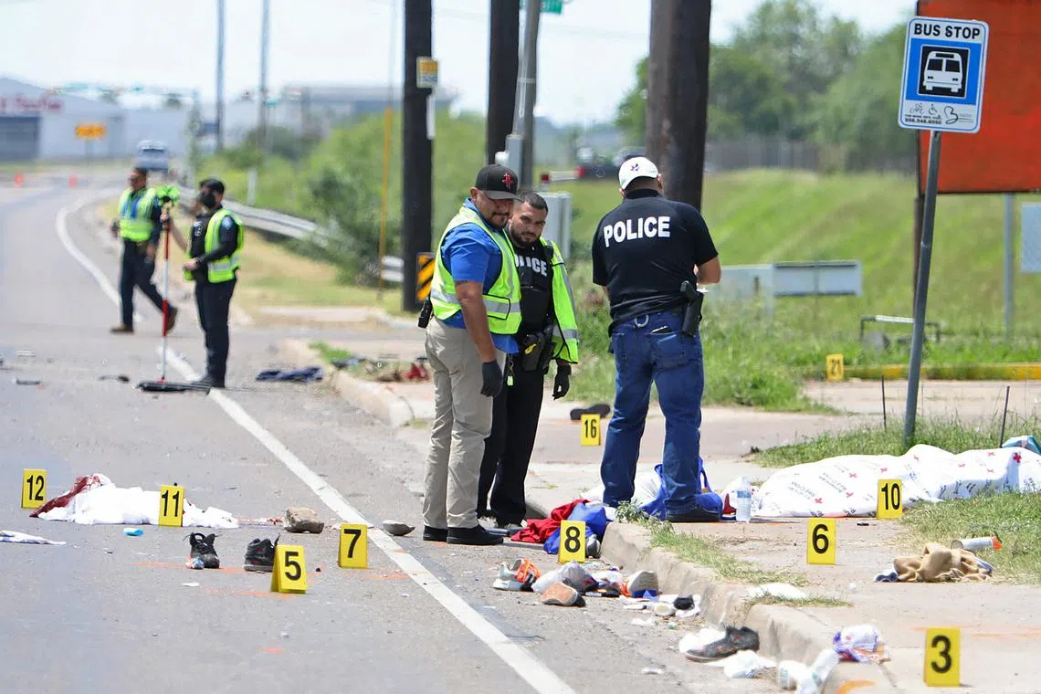 Law enforcement officers on the scene after a car ran into pedestrians near Ozanam Center, a shelter for migrants and homeless, in Brownsville, Texas, on May 7, 2023.