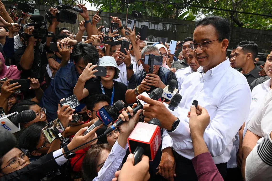 FILE PHOTO: Presidential candidate Anies Baswedan delivers a statement to the media after quick count results of the general election, in Jakarta, Indonesia February 14, 2024. Antara Foto/Aditya Pradana Putra via REUTERS. ATTENTION EDITORS - THIS IMAGE HAS BEEN SUPPLIED BY A THIRD PARTY. MANDATORY CREDIT. INDONESIA OUT. NO COMMERCIAL OR EDITORIAL SALES IN INDONESIA./File Photo