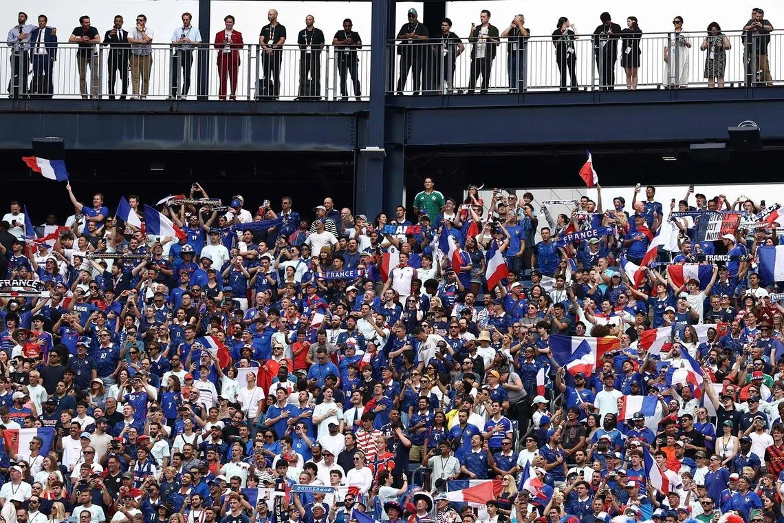 French fans cheer ahead of the 2026 World Cup Group I football match between Norway and France at the Boston Stadium in Foxborough on June 26.