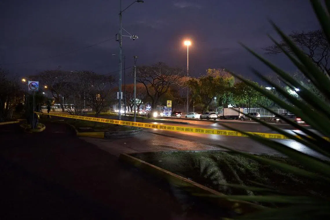A police barricade tape is seen at a cordoned-off area where Ecuadorean prosecutor Cesar Suarez, who focused on cases involving organized trans-national crime in Guayas province, was killed, in Guayaquil, Ecuador, January 17, 2024. REUTERS/Vicente Gaibor del Pino/File Photo
