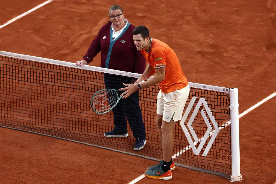 Poland's Hubert Hurkacz arguing with the chair umpire during his 7-6 (7-5), 6-4, 7-6 (7-3) French Open fourth-round defeat by Bulgaria's Grigor Dimitrov on June 2.