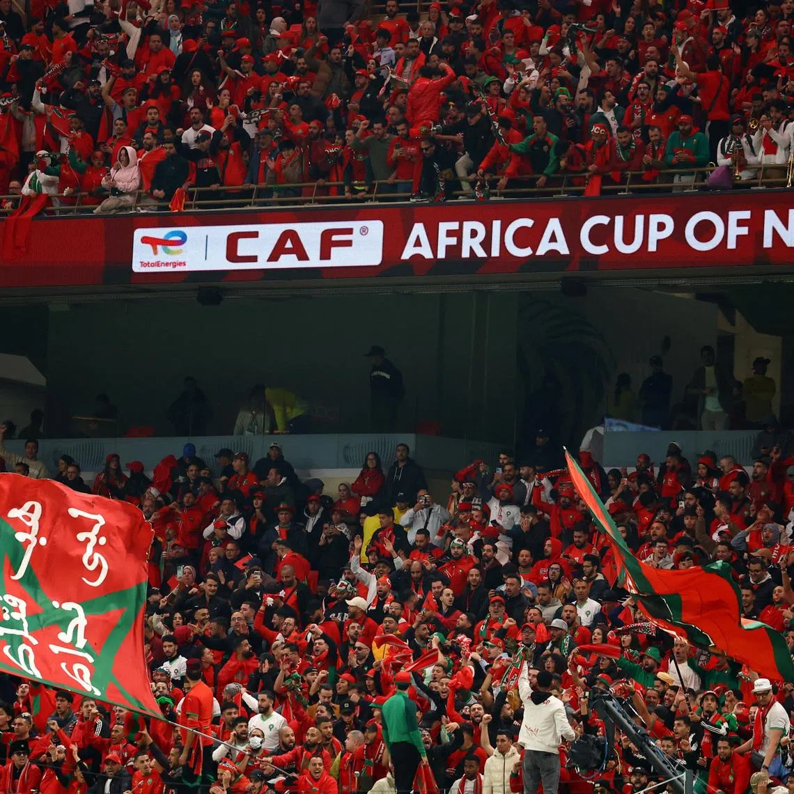 Soccer Football - CAF Africa Cup of Nations - Morocco 2025 - Semi Final - Nigeria v Morocco - Prince Moulay Abdellah Stadium, Rabat, Morocco - January 14, 2026 Morocco fans with flags inside the stadium before the match REUTERS/Siphiwe Sibeko