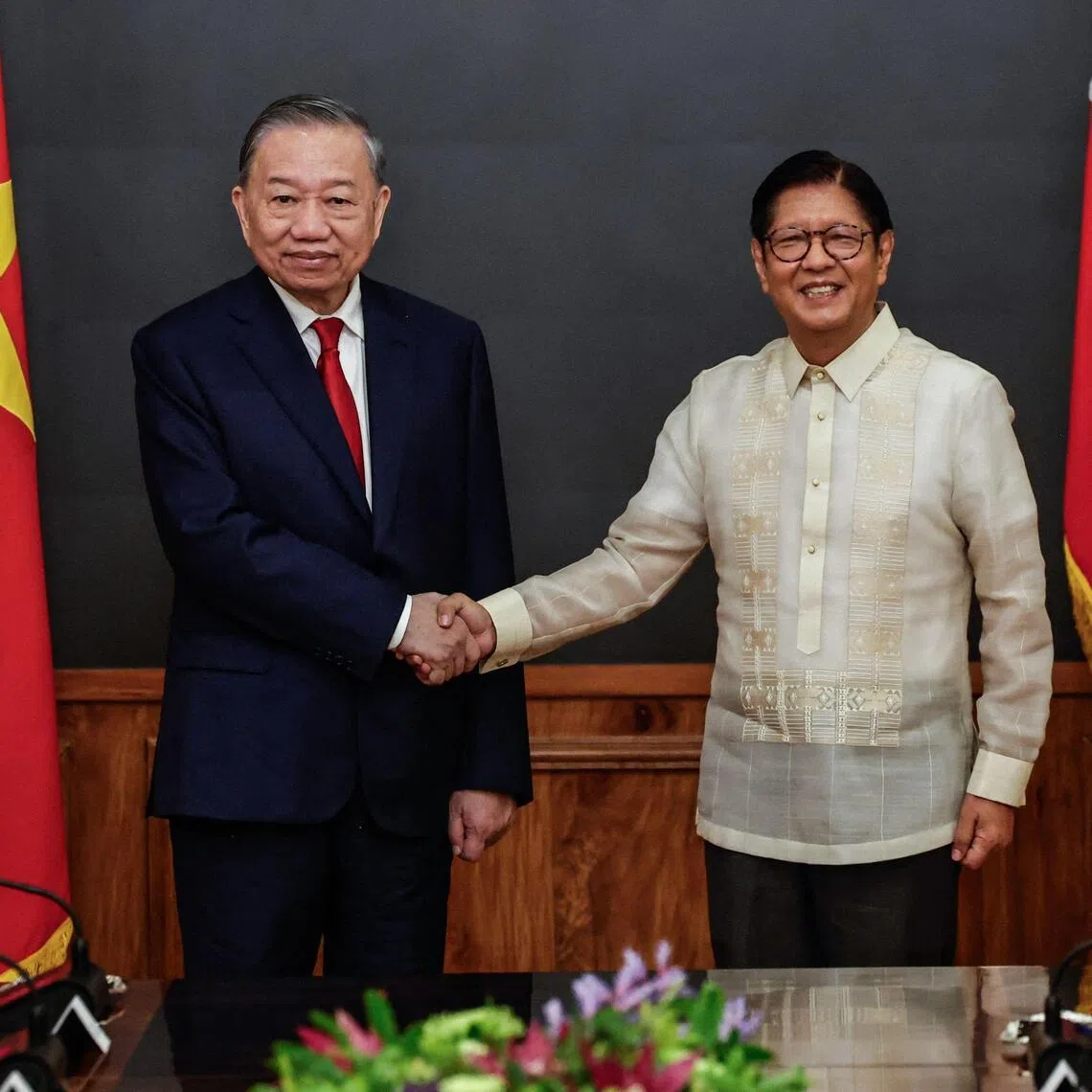 Vietnam's top leader To Lam and Philippines' President Ferdinand Marcos Jr. shake hands during a bilateral meeting at Malacanang Presidential Palace in Manila on June 1.