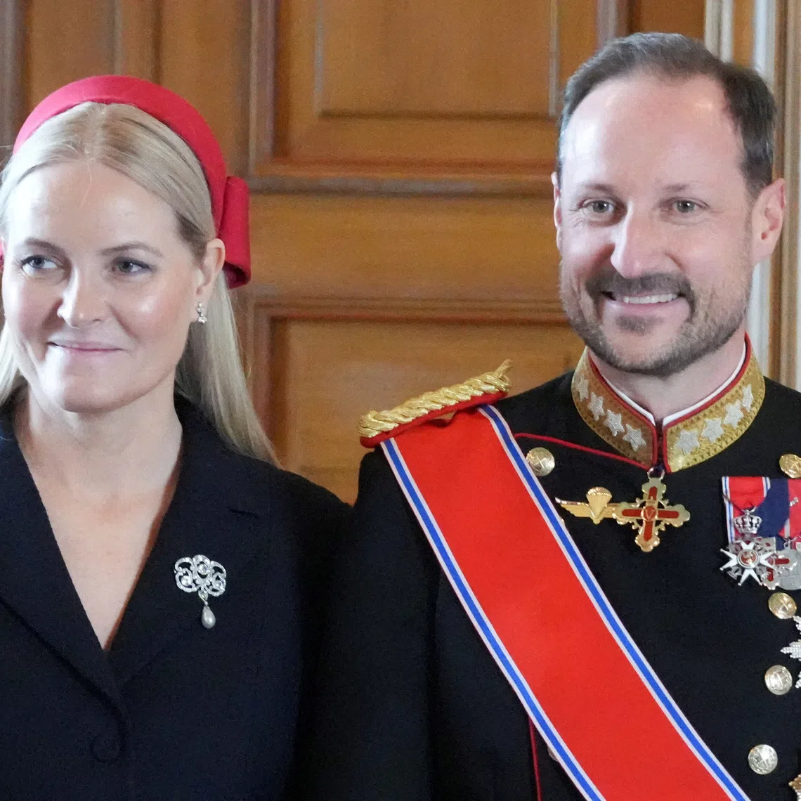 FILE PHOTO: Norway's Crown Prince Haakon and Crown Princess Mette-Marit pose for a photo in the Bird Room at the Royal Palace, in Oslo, Norway, March 24, 2026.  NTB/Ole Berg-Rusten via REUTERS   ATTENTION EDITORS - THIS IMAGE WAS PROVIDED BY A THIRD PARTY. NORWAY OUT. NO COMMERCIAL OR EDITORIAL SALES IN NORWAY./File Photo