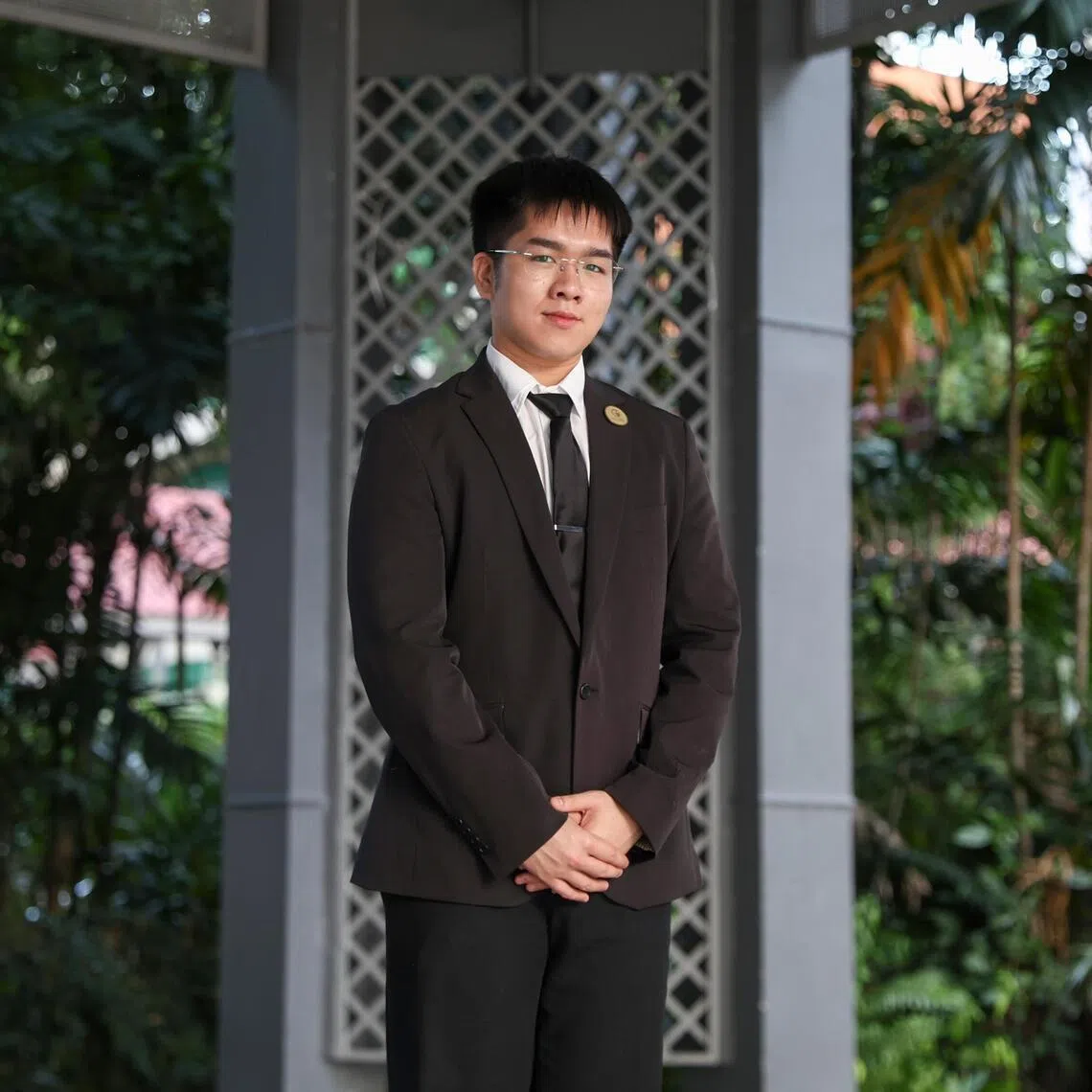 Shane Tan is 21 years old and recently took over from his father as the funeral director at SG 24 Hour Funeral Services.