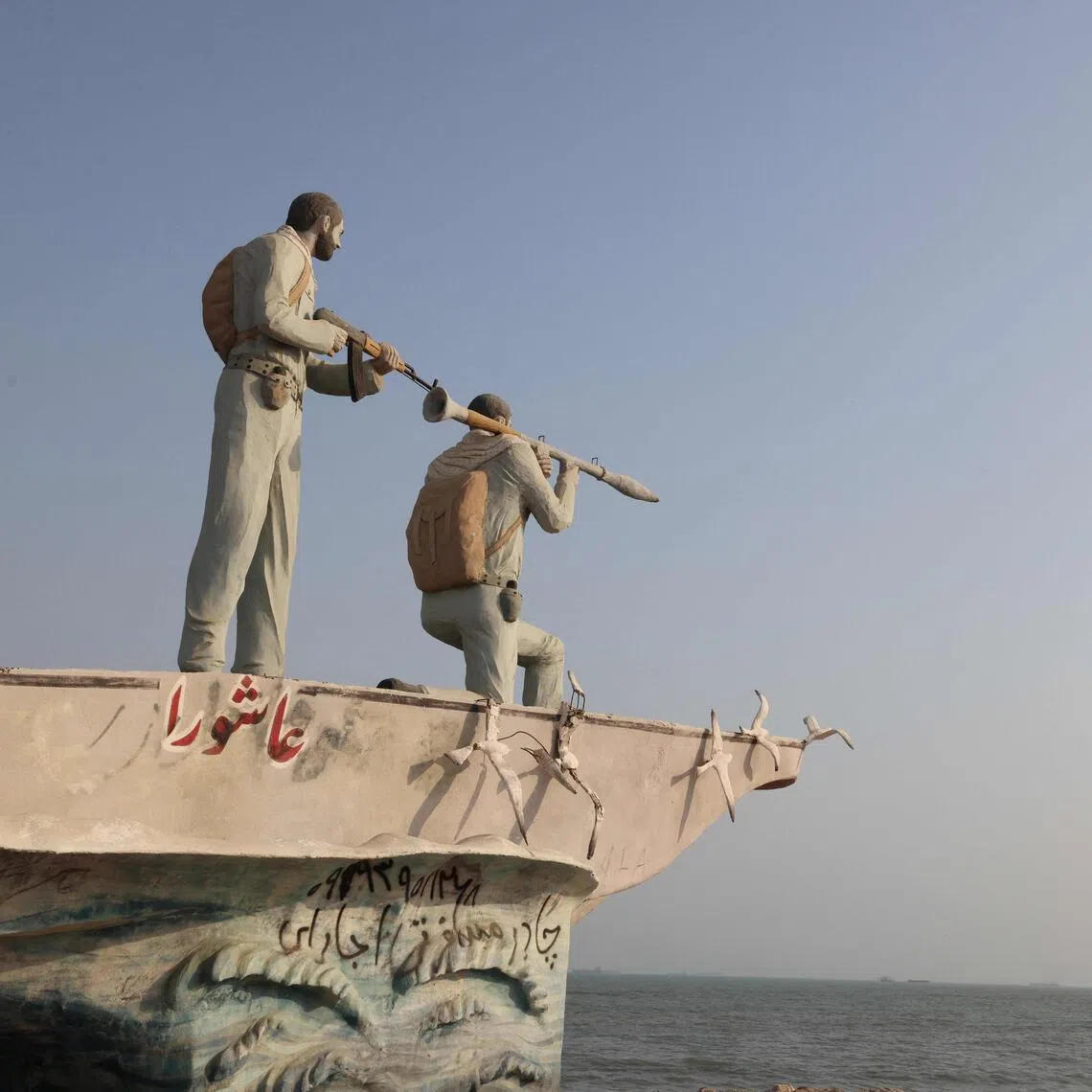 A sculpture overlooking the Strait of Hormuz is seen along the seafront in the port city of Bandar Abbas, in southern Iran.