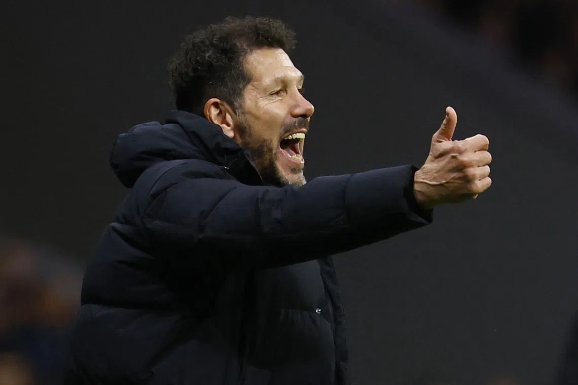 Soccer Football - LaLiga - Atletico Madrid v FC Barcelona - Metropolitano, Madrid, Spain - March 16, 2025 Atletico Madrid coach Diego Simeone reacts during the match REUTERS/Susana Vera