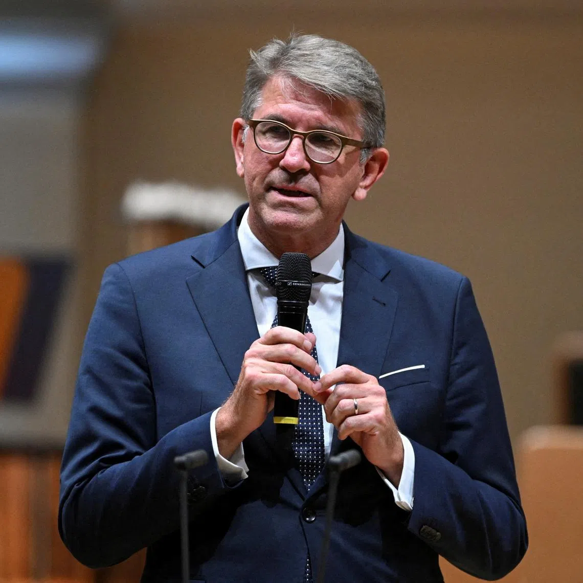 FILE PHOTO: Wolfram Weimer, Federal Government Commissioner for Culture and the Media of Germany, speaks before Israeli conductor Lahav Shani performs with the Munich Philharmonic Orchestra during a guest performance at the Konzerthaus Berlin as part of the ongoing Musikfest Berlin, following their disinvitation from the Flanders Festival Ghent, in Berlin, Germany September 15, 2025. REUTERS/Annegret Hilse/File Photo
