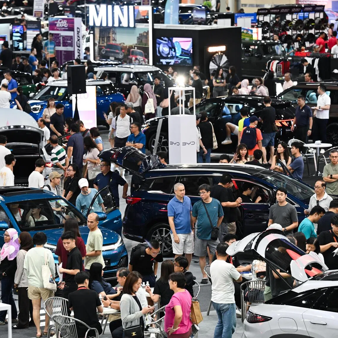 ST20250927-202538400836-Lim Yaohui-pixcarexpo27/
Visitors to the Car Expo 2025 at Singapore Expo, Hall 4 & 5 on Sept 27, 2025.
It runs from 27 – 28 Sept 2025 and is a pit stop for all things automotive. Visitors can explore top car and accessories brands under one roof — from the newest models to the latest in cutting-edge tech.
There are 47 participating brands. 3 Authorised Distributors (AVATR, CUPRA, IM Motors), and 3 Pre-Owned (Auto Selection, MYCAR, Vin’s Automotive Group) exhibitors are joining for the first time.
(ST PHOTO: LIM YAOHUI)
