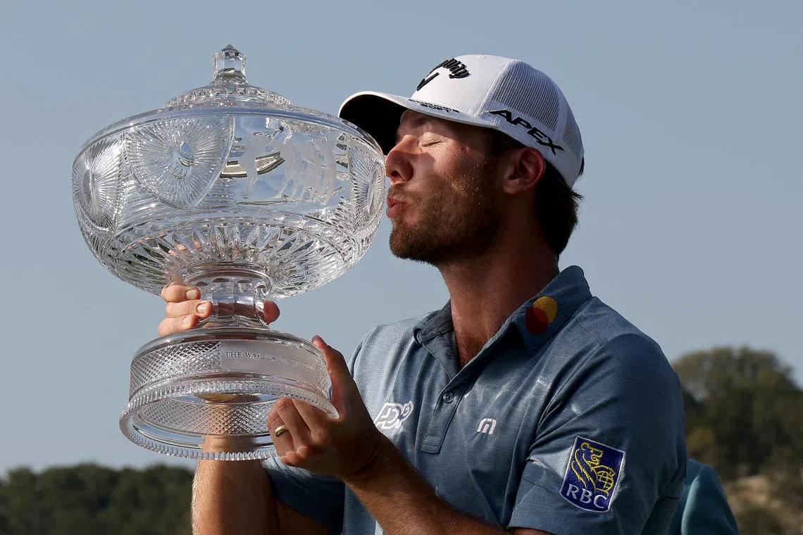 Sam Burns of the United States kissing the trophy after winning the World Golf Championships-Dell Technologies Match Play at Austin Country Club in Austin, Texas.   