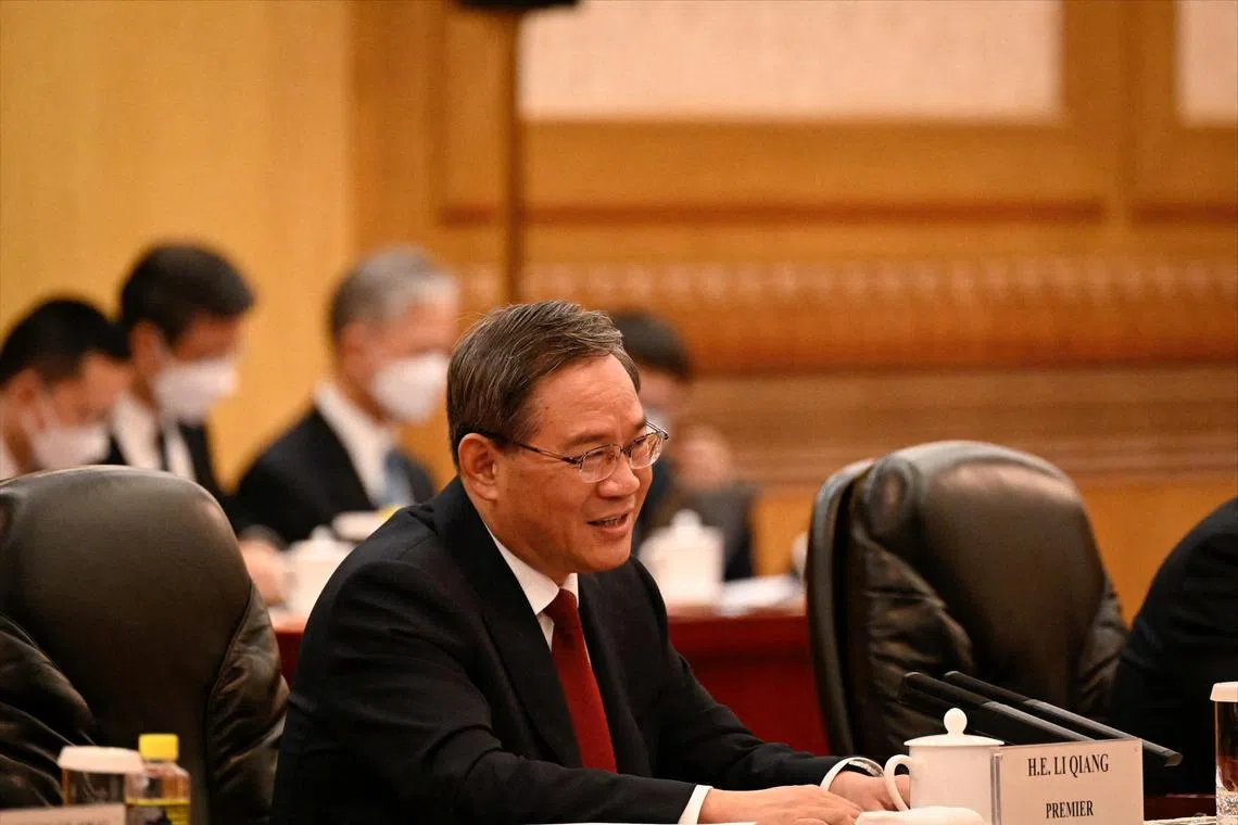 The meeting with Premier Li Qiang signals that Beijing is ending its crackdown on the tech industry amid a weakening economy.