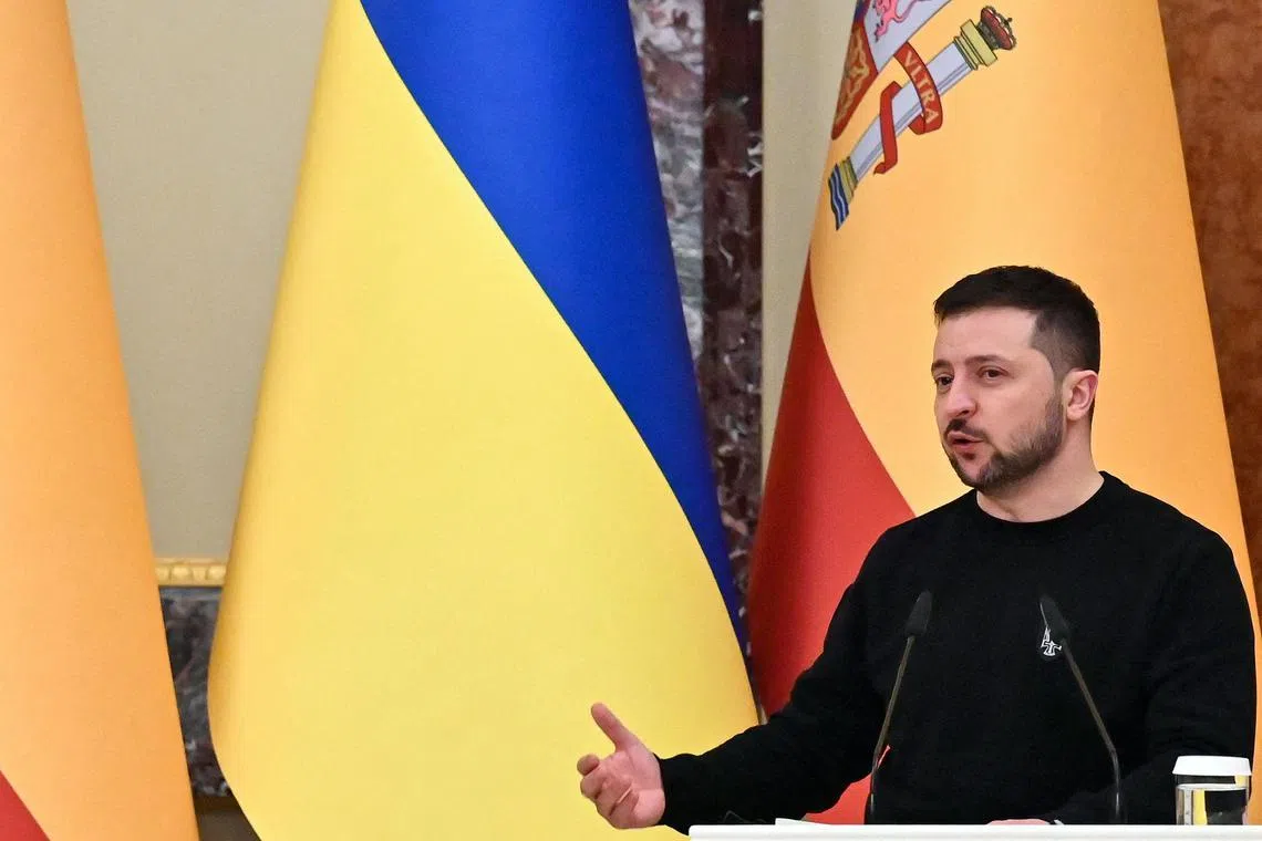 Ukrainian President Volodymyr Zelensky speaks during a joint press conference with Spain's Prime Minister in Kyiv.