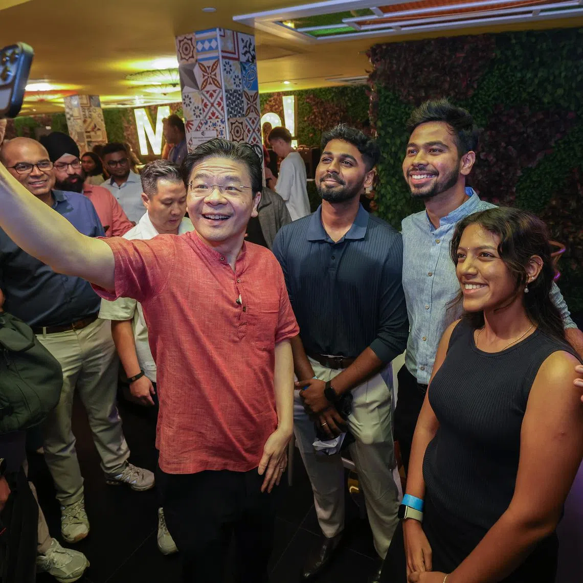 Prime Minister Lawrence Wong taking a wefie at a dialogue with Indian youth on April 13.